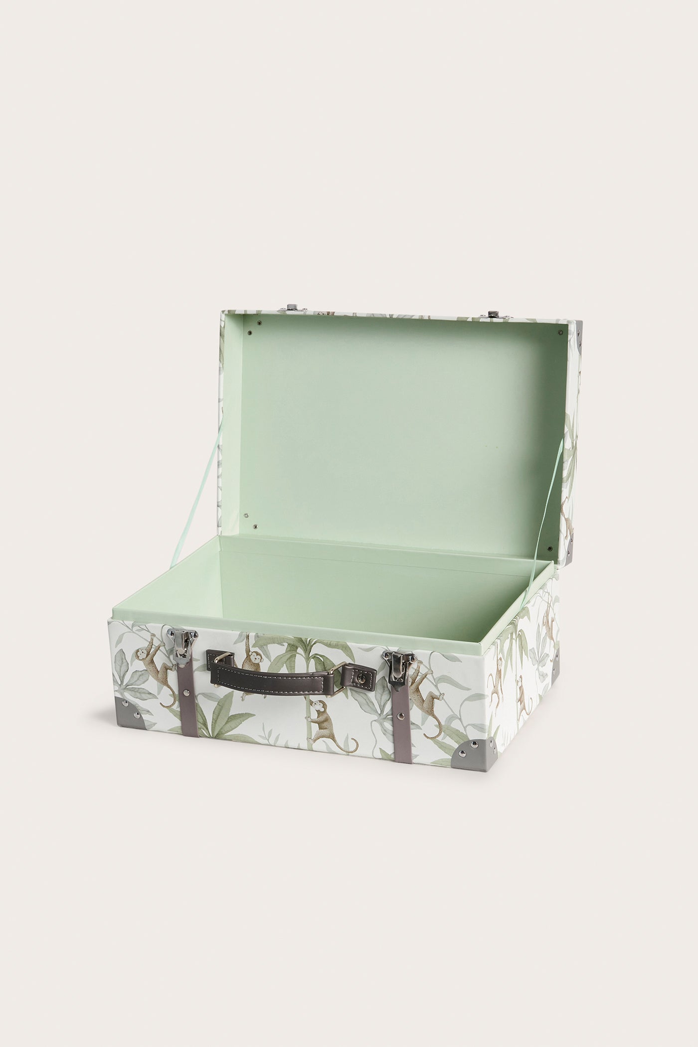 Green jungle patterned cardboard bag