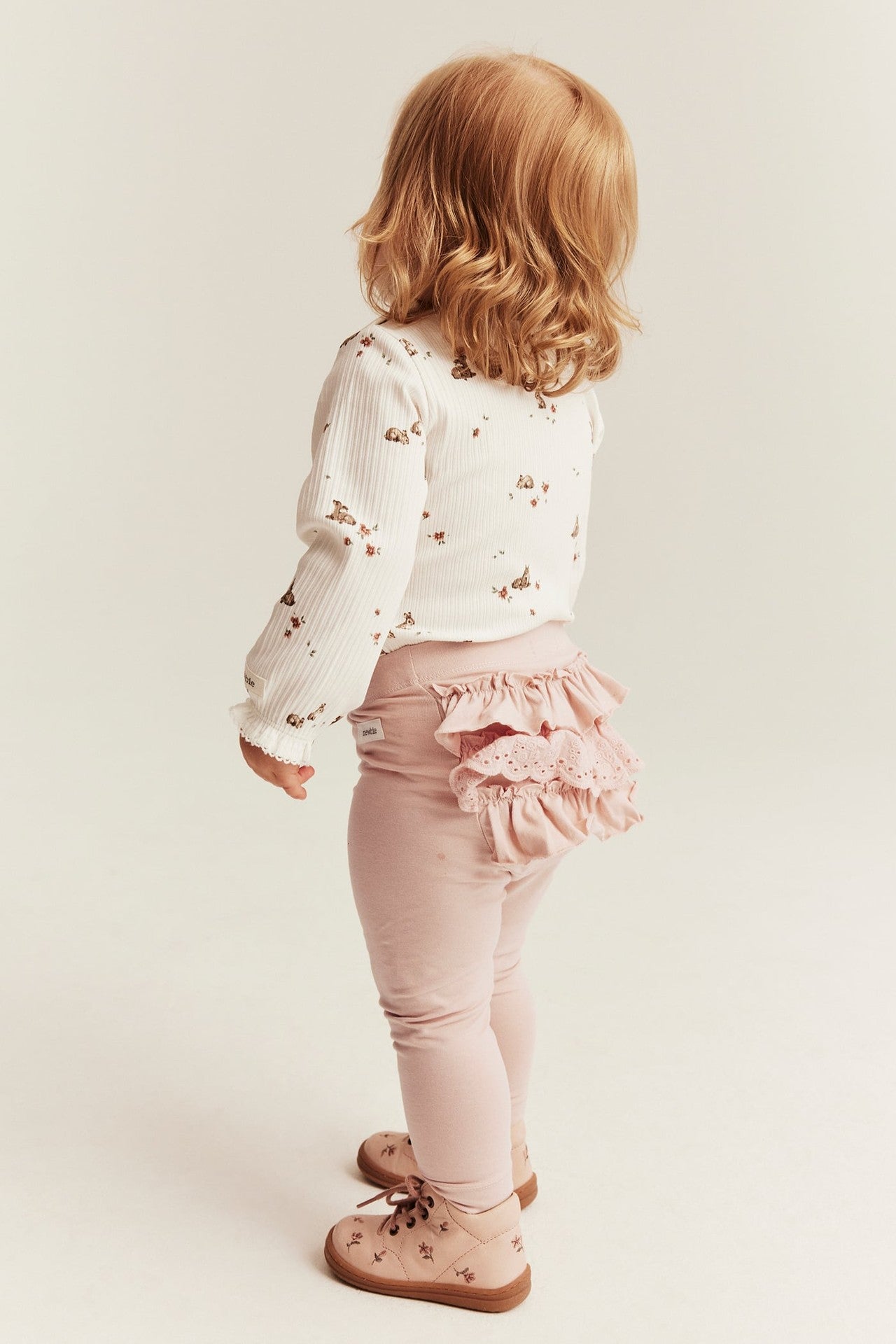 Baby light pink leggings with ruffles