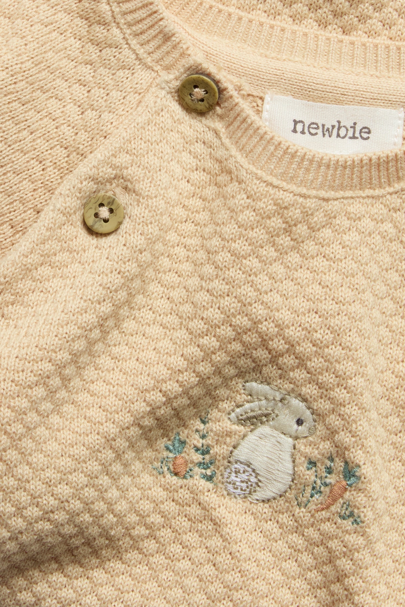 Baby orange knitted jumpsuit with embroidered rabbit