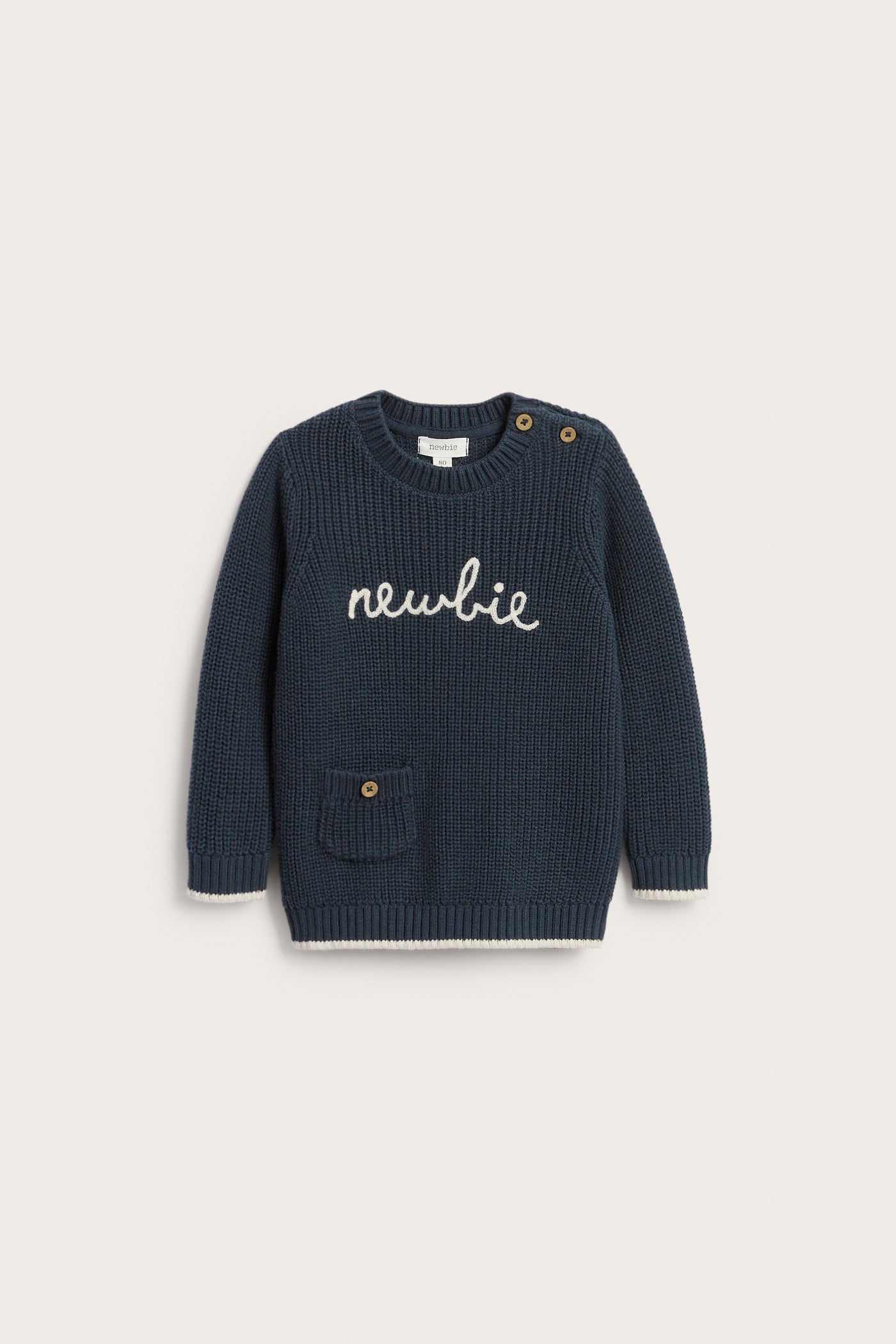 Baby blue knitted jumper with Newbie logo