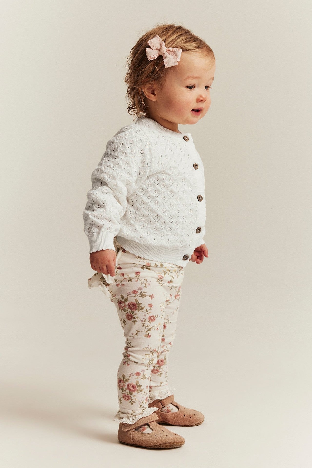 Baby white pattern‑knitted cardigan
