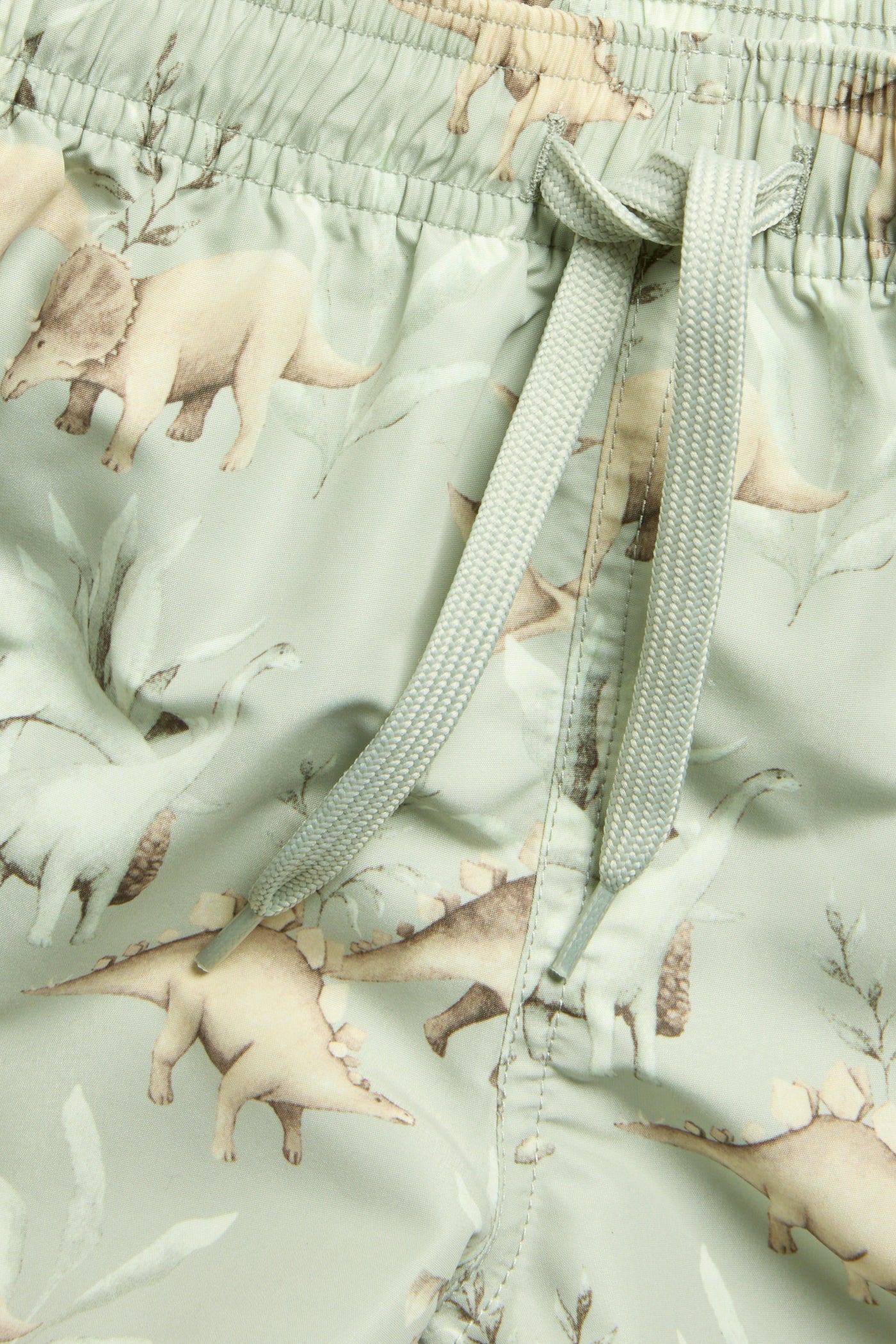 Baby & kids green swimming trunks with dinosaurs