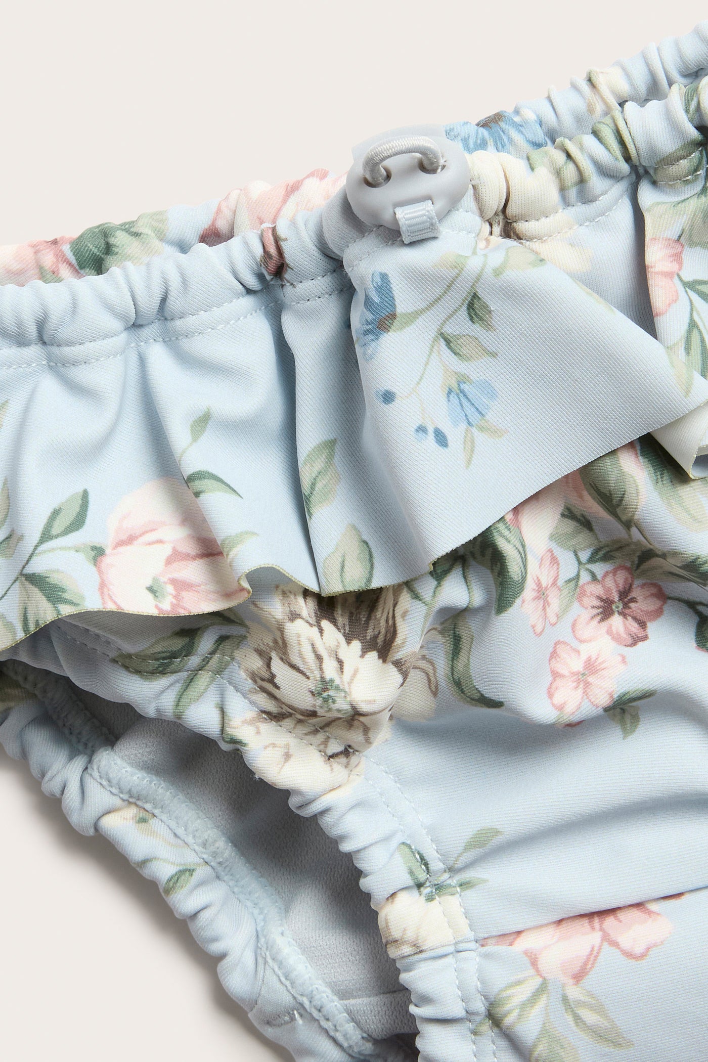 Baby blue floral swim nappy with frill