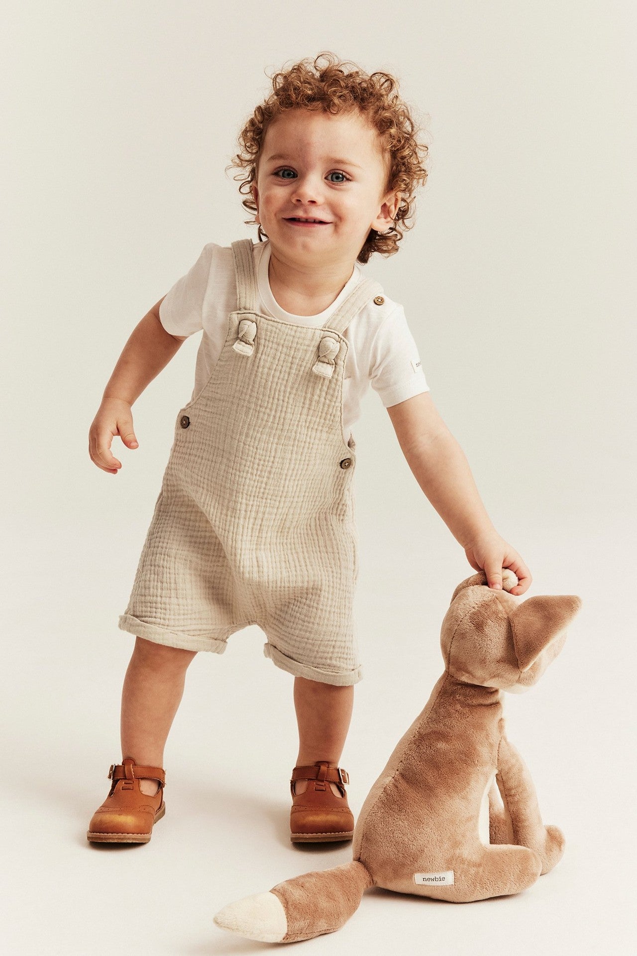 Baby beige dungaree shorts