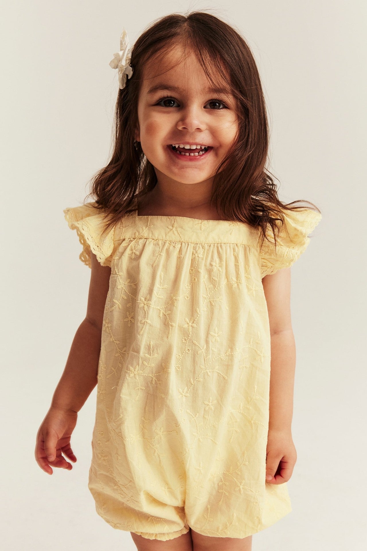 Baby embroidered woven romper