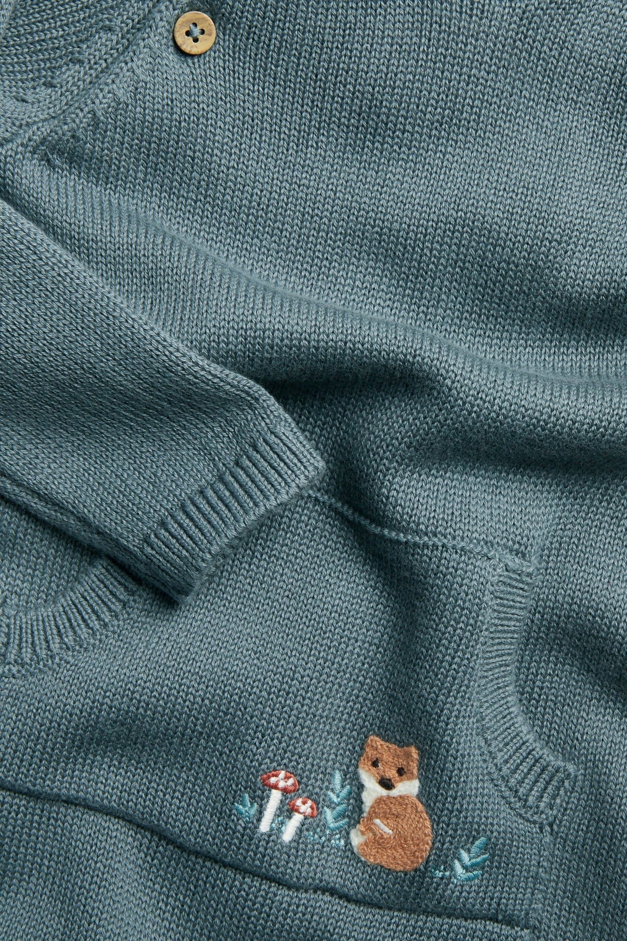 Baby knitted jumpsuit with embroidery