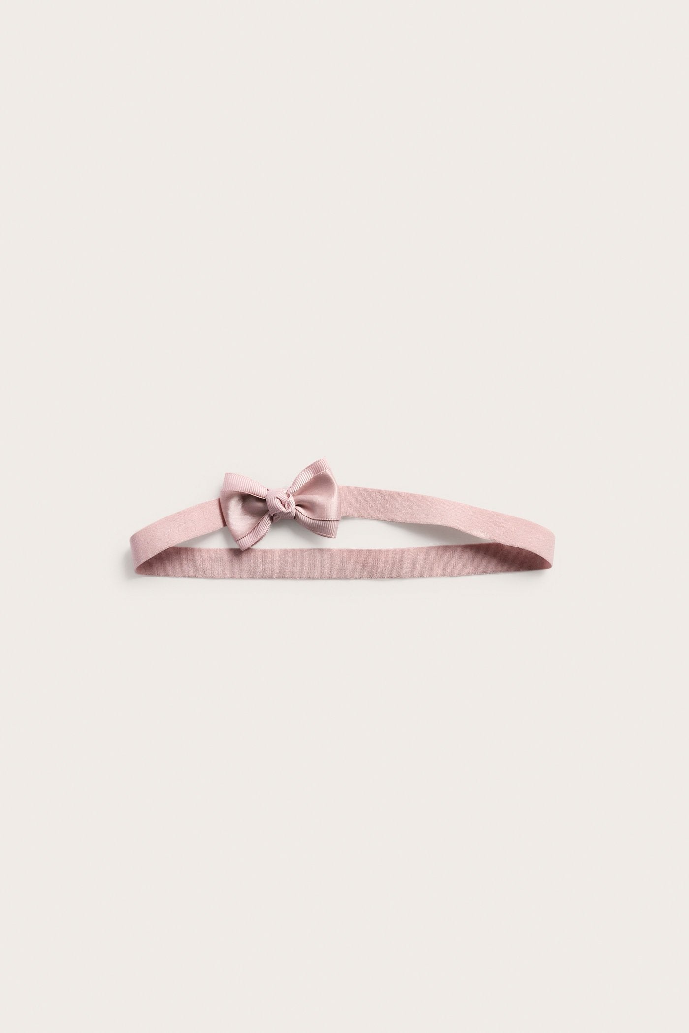 Baby pink hairband with satin bow