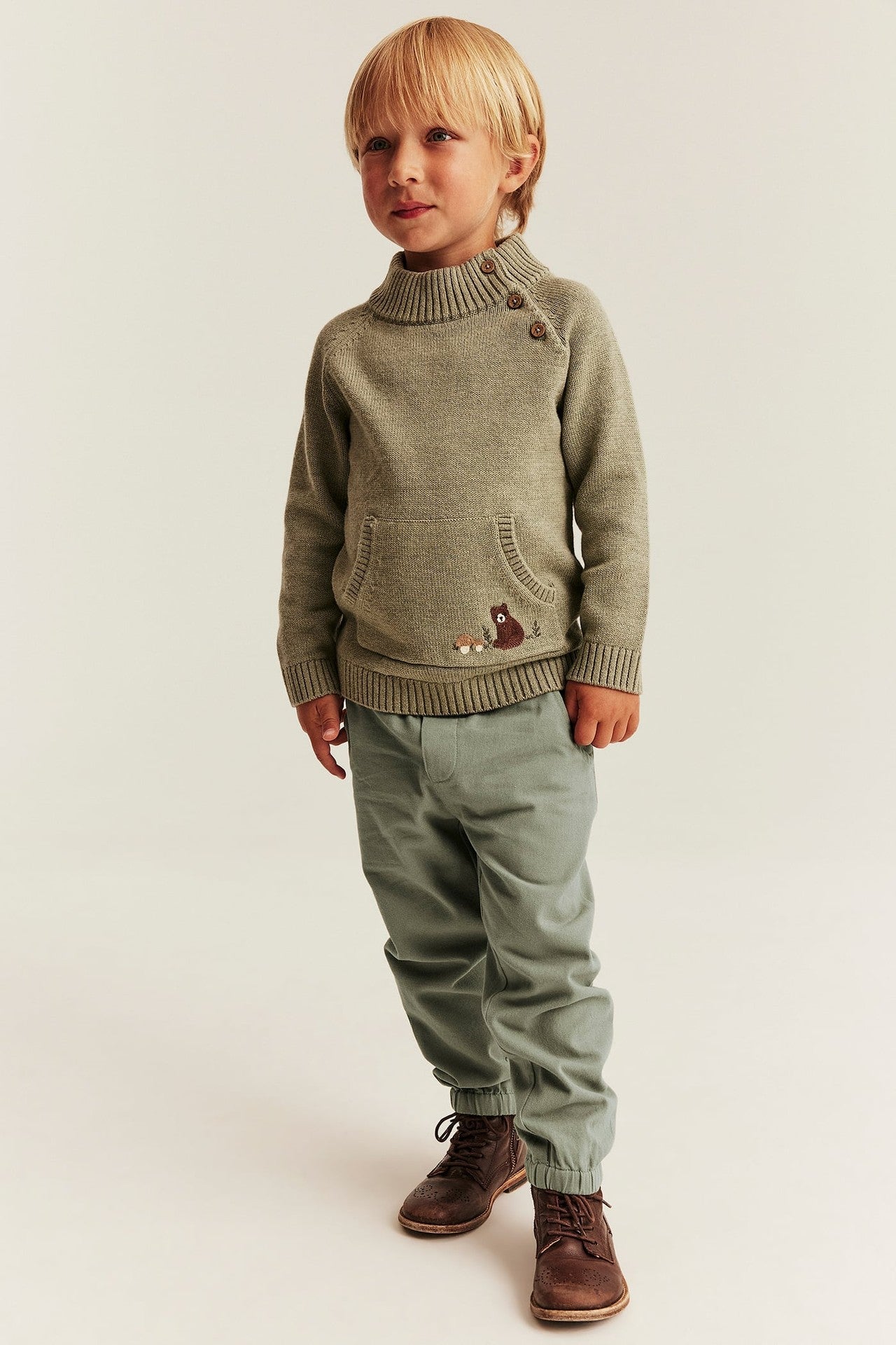Kids green trousers with embroidery