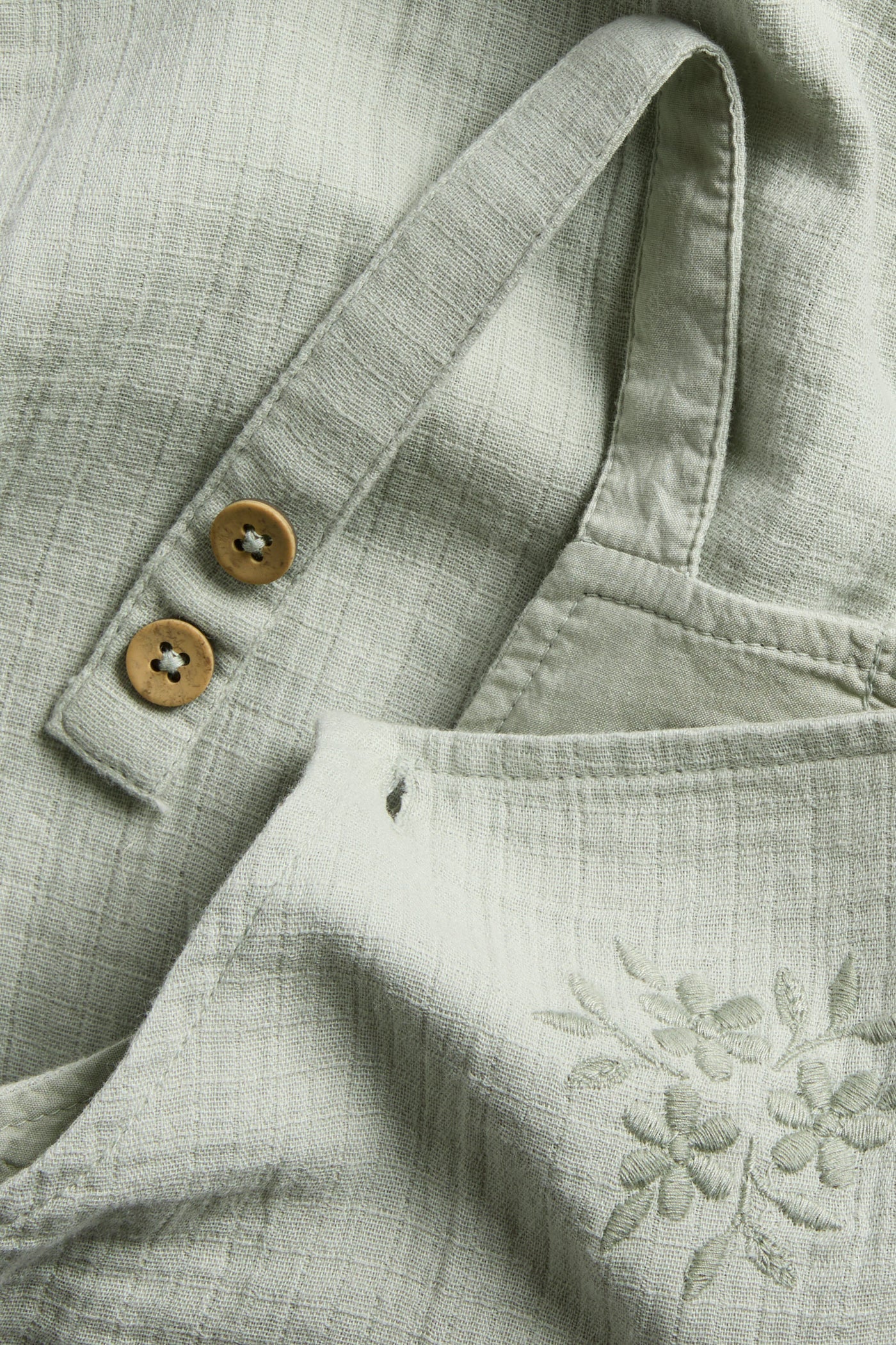 Baby dungarees with lace frill