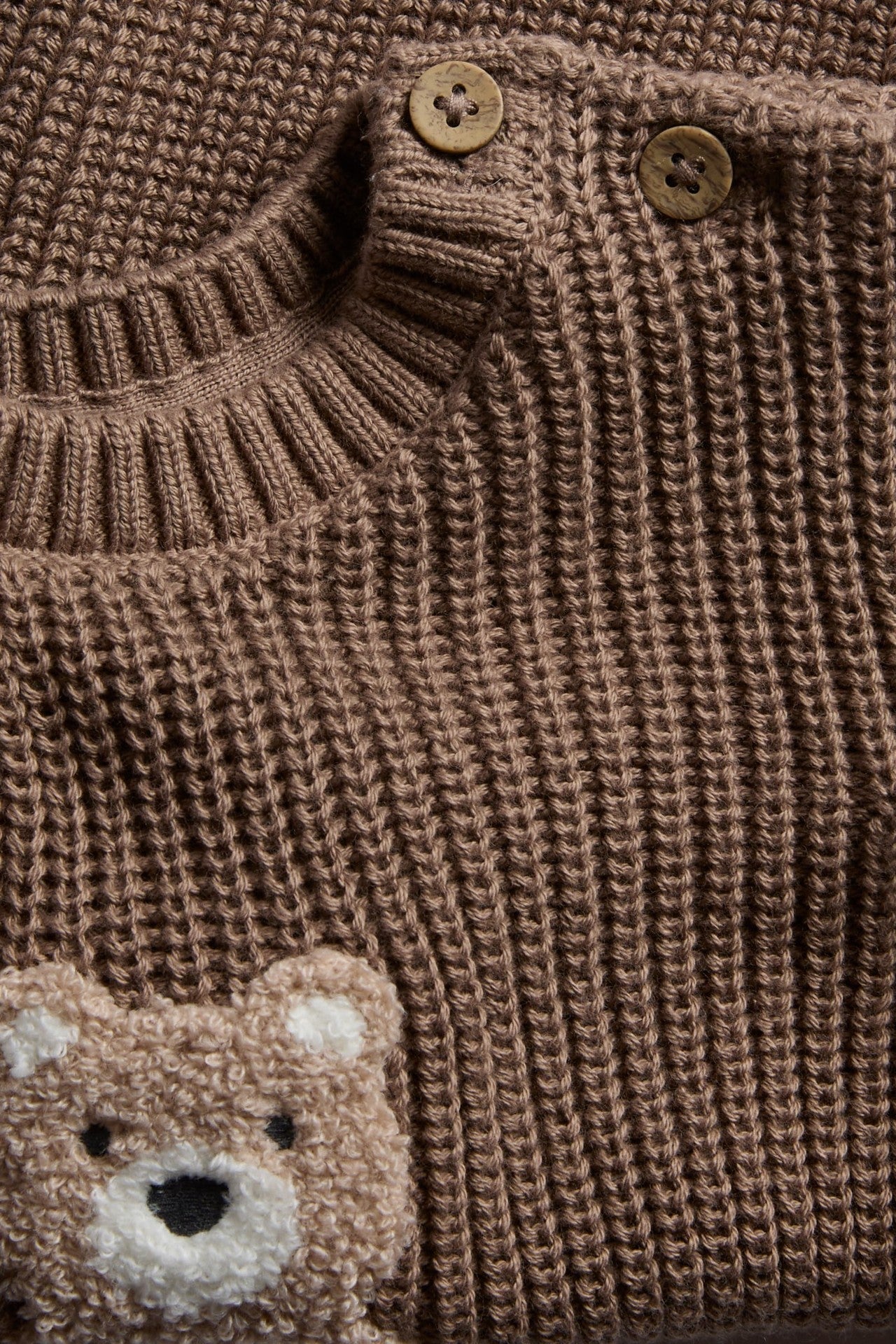 Baby knitted sweater with teddy bear