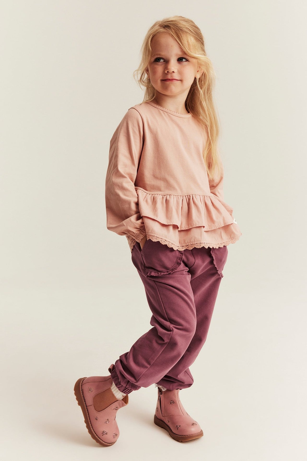 Kids jogging bottoms with lace details