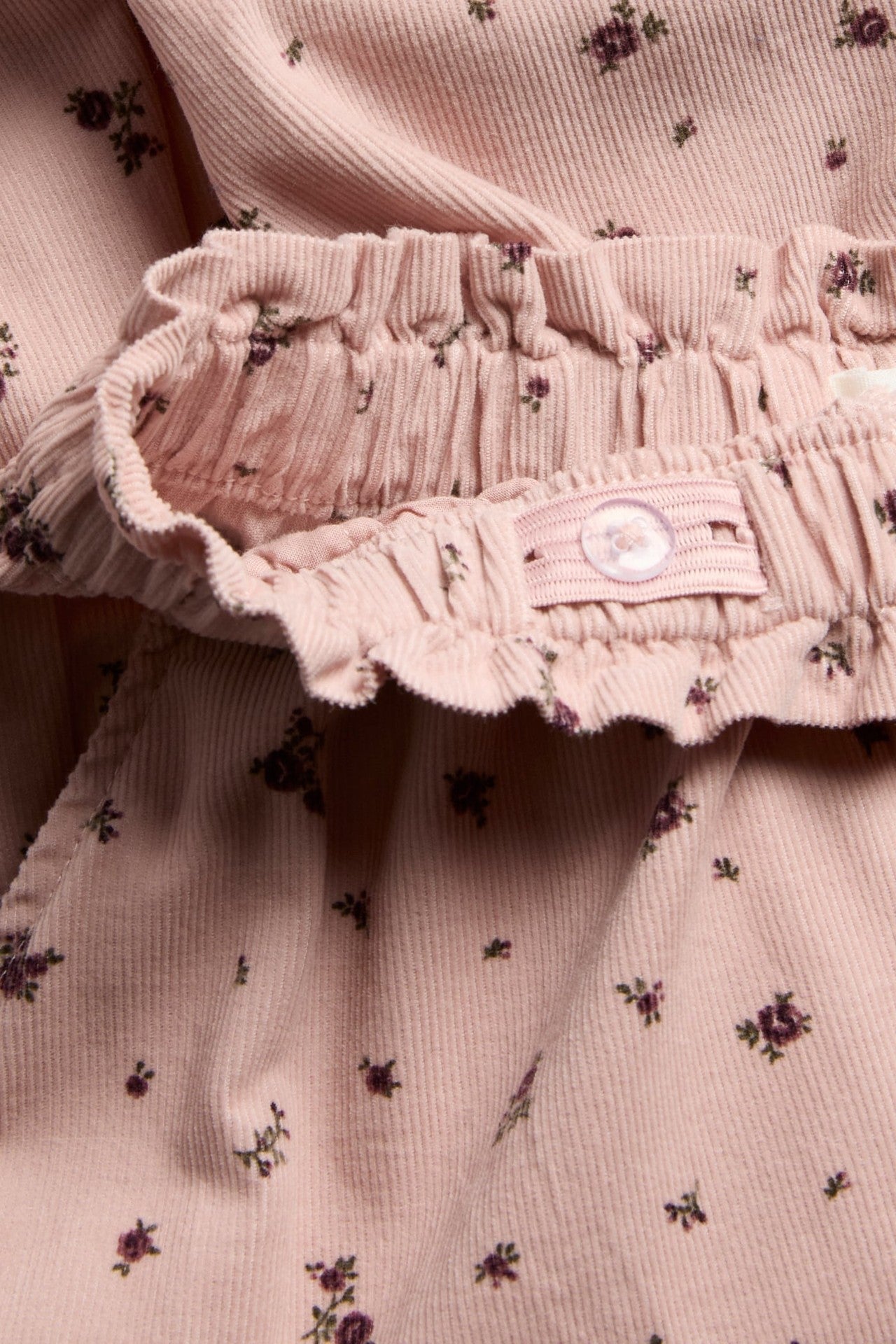 Kids pink floral corduroy trousers