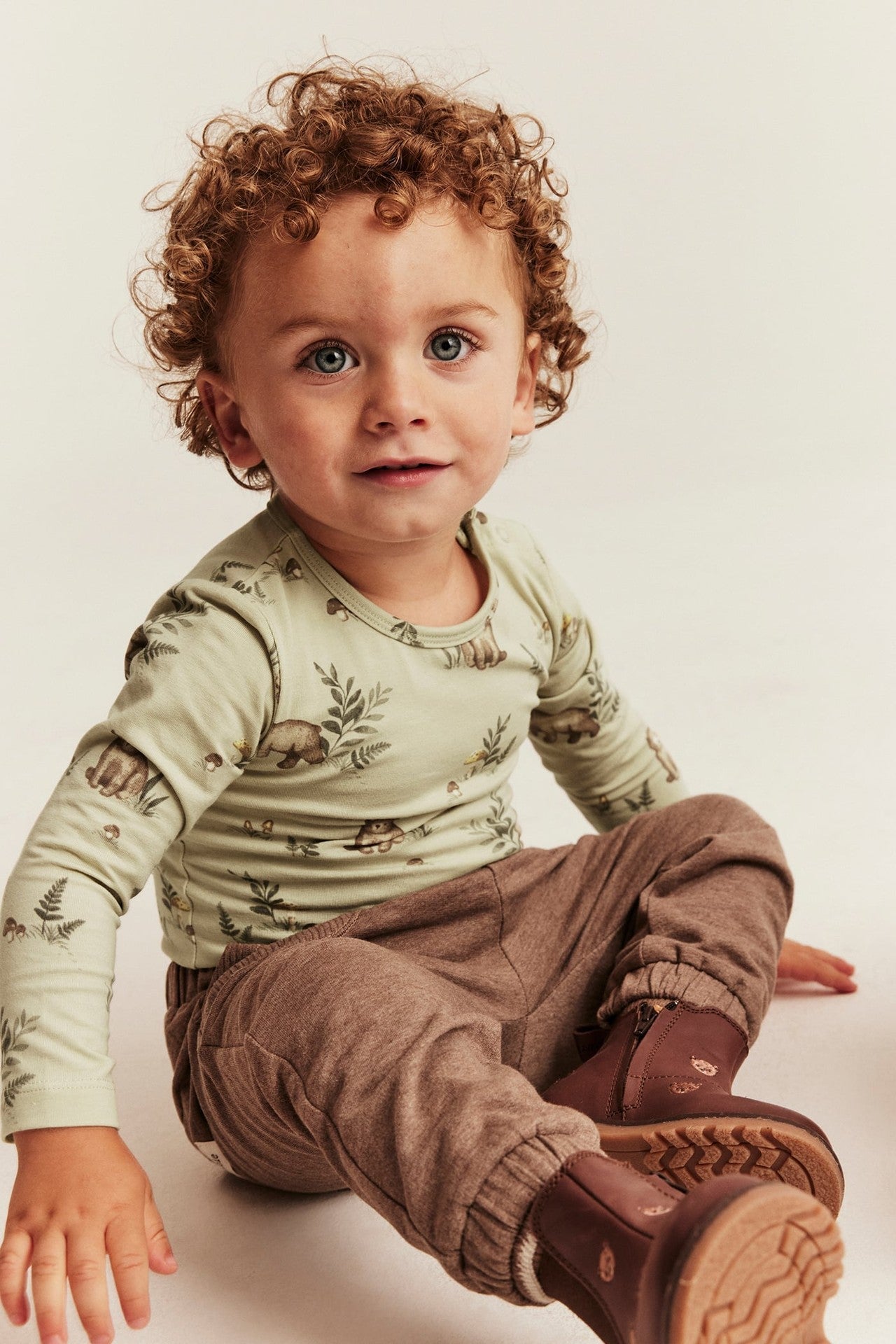 Baby green bodysuit with bear print