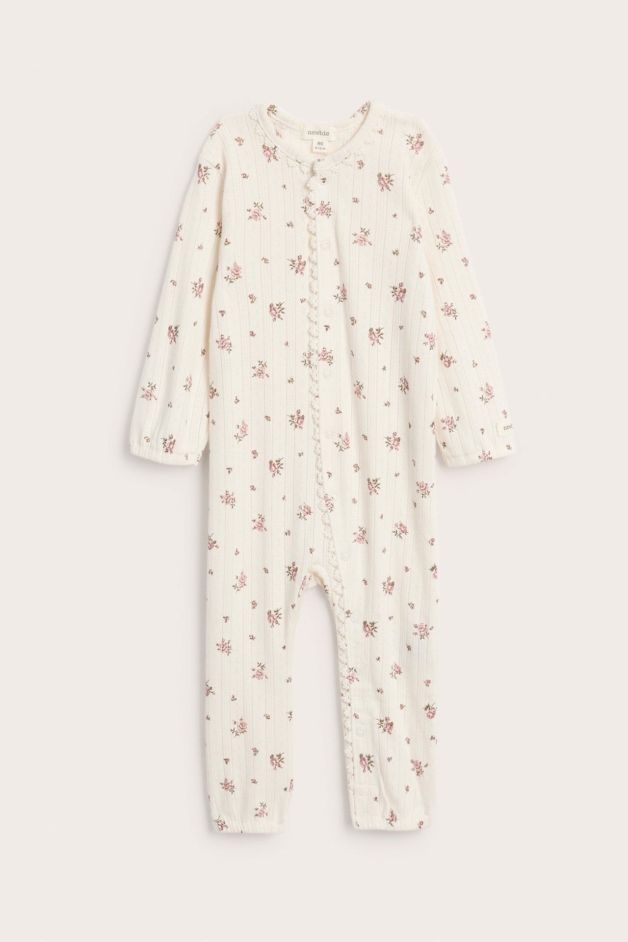 Baby pyjamas with rose pattern